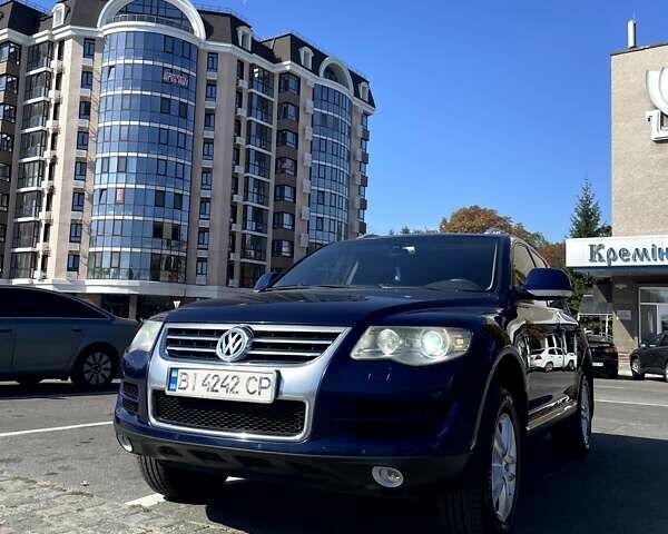 Синий Фольксваген Туарег, объемом двигателя 2.97 л и пробегом 246 тыс. км за 13000 $, фото 1 на Automoto.ua