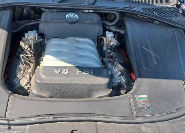 Синий Фольксваген Туарег, объемом двигателя 4.2 л и пробегом 210 тыс. км за 7500 $, фото 7 на Automoto.ua