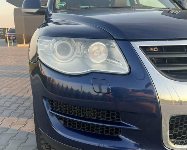 Синий Фольксваген Туарег, объемом двигателя 3 л и пробегом 235 тыс. км за 11100 $, фото 4 на Automoto.ua