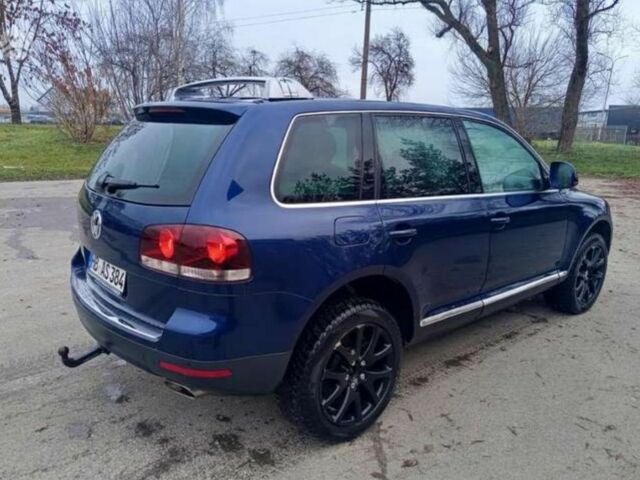 Синій Фольксваген Туарег, об'ємом двигуна 3 л та пробігом 300 тис. км за 6200 $, фото 3 на Automoto.ua