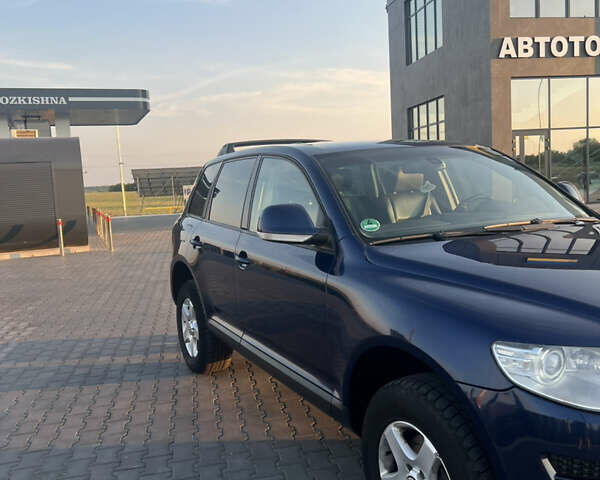 Синий Фольксваген Туарег, объемом двигателя 3 л и пробегом 235 тыс. км за 11100 $, фото 2 на Automoto.ua