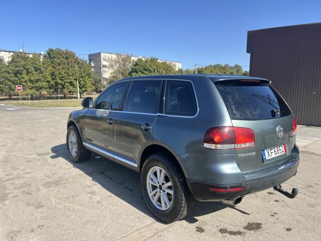 Синий Фольксваген Туарег, объемом двигателя 2.5 л и пробегом 294 тыс. км за 6000 $, фото 16 на Automoto.ua