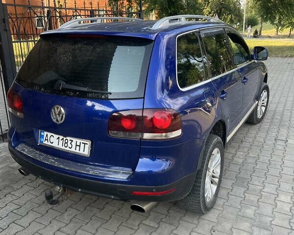 Синий Фольксваген Туарег, объемом двигателя 3 л и пробегом 265 тыс. км за 7999 $, фото 2 на Automoto.ua