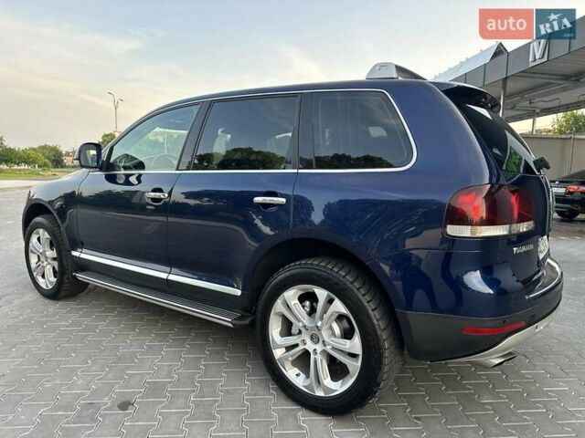 Синий Фольксваген Туарег, объемом двигателя 4.16 л и пробегом 385 тыс. км за 8500 $, фото 2 на Automoto.ua
