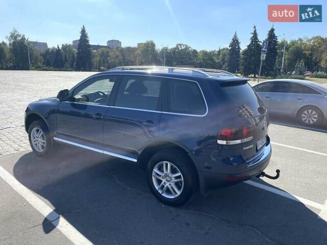 Синий Фольксваген Туарег, объемом двигателя 2.97 л и пробегом 246 тыс. км за 13000 $, фото 8 на Automoto.ua