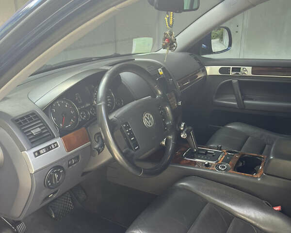 Синий Фольксваген Туарег, объемом двигателя 3 л и пробегом 386 тыс. км за 12300 $, фото 8 на Automoto.ua