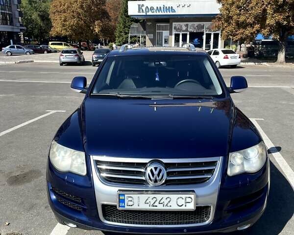 Синий Фольксваген Туарег, объемом двигателя 2.97 л и пробегом 246 тыс. км за 13000 $, фото 2 на Automoto.ua