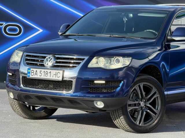 Синій Фольксваген Туарег, об'ємом двигуна 4.9 л та пробігом 259 тис. км за 13499 $, фото 1 на Automoto.ua