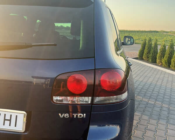 Синий Фольксваген Туарег, объемом двигателя 3 л и пробегом 235 тыс. км за 11100 $, фото 6 на Automoto.ua