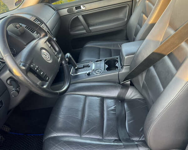 Синий Фольксваген Туарег, объемом двигателя 3 л и пробегом 235 тыс. км за 11100 $, фото 8 на Automoto.ua