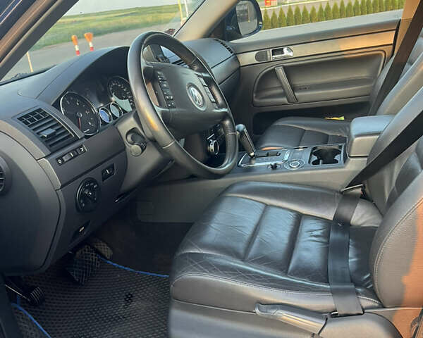 Синий Фольксваген Туарег, объемом двигателя 3 л и пробегом 235 тыс. км за 11100 $, фото 19 на Automoto.ua