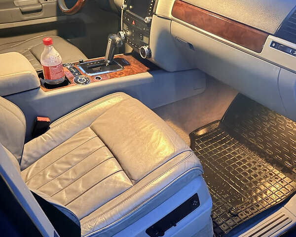 Синий Фольксваген Туарег, объемом двигателя 3 л и пробегом 265 тыс. км за 7999 $, фото 3 на Automoto.ua