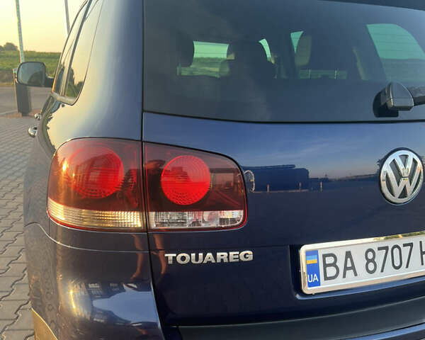 Синий Фольксваген Туарег, объемом двигателя 3 л и пробегом 235 тыс. км за 11100 $, фото 7 на Automoto.ua