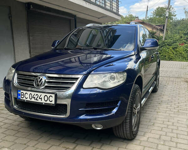 Синий Фольксваген Туарег, объемом двигателя 3 л и пробегом 386 тыс. км за 12300 $, фото 1 на Automoto.ua