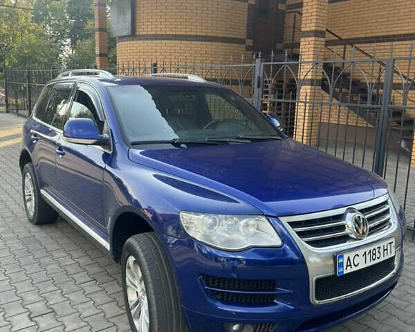 Синий Фольксваген Туарег, объемом двигателя 3 л и пробегом 265 тыс. км за 7999 $, фото 1 на Automoto.ua