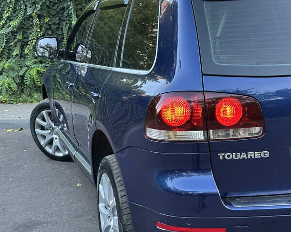 Синій Фольксваген Туарег, об'ємом двигуна 3 л та пробігом 306 тис. км за 12500 $, фото 10 на Automoto.ua