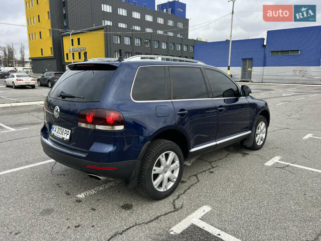 Синій Фольксваген Туарег, об'ємом двигуна 2.97 л та пробігом 236 тис. км за 11900 $, фото 5 на Automoto.ua