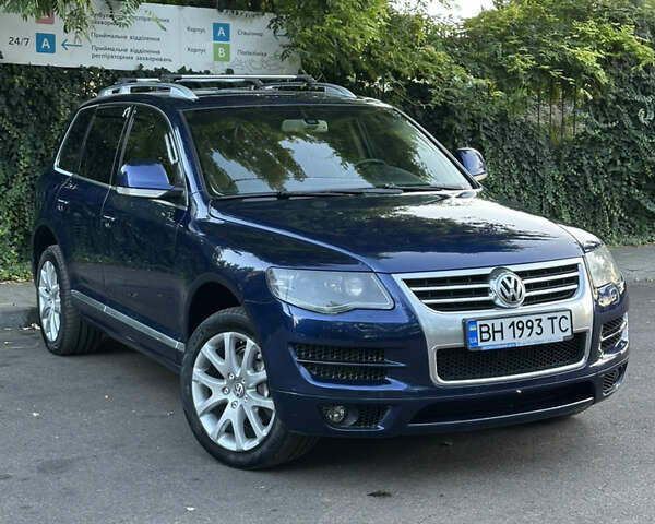 Синій Фольксваген Туарег, об'ємом двигуна 3 л та пробігом 306 тис. км за 12500 $, фото 2 на Automoto.ua