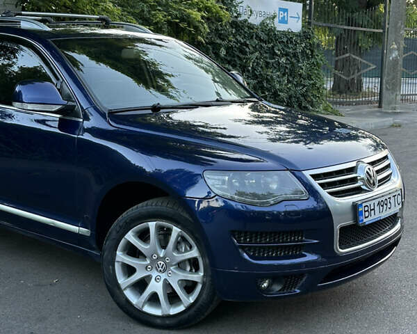 Синій Фольксваген Туарег, об'ємом двигуна 3 л та пробігом 306 тис. км за 12500 $, фото 1 на Automoto.ua