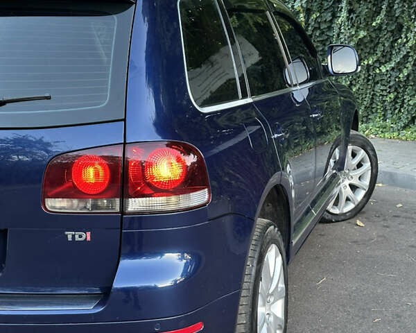 Синій Фольксваген Туарег, об'ємом двигуна 3 л та пробігом 306 тис. км за 12500 $, фото 9 на Automoto.ua