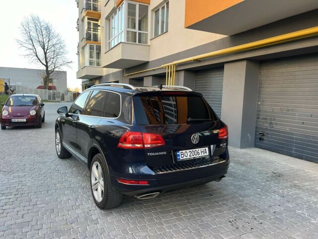 Синий Фольксваген Туарег, объемом двигателя 3 л и пробегом 317 тыс. км за 18000 $, фото 1 на Automoto.ua