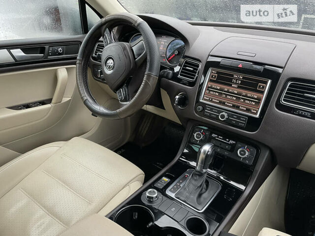 Синий Фольксваген Туарег, объемом двигателя 3 л и пробегом 201 тыс. км за 15500 $, фото 25 на Automoto.ua