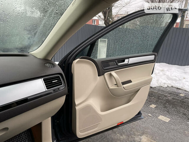 Синий Фольксваген Туарег, объемом двигателя 3 л и пробегом 201 тыс. км за 15500 $, фото 24 на Automoto.ua