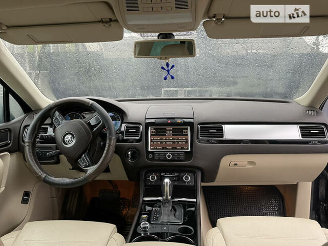 Синий Фольксваген Туарег, объемом двигателя 3 л и пробегом 201 тыс. км за 15500 $, фото 23 на Automoto.ua