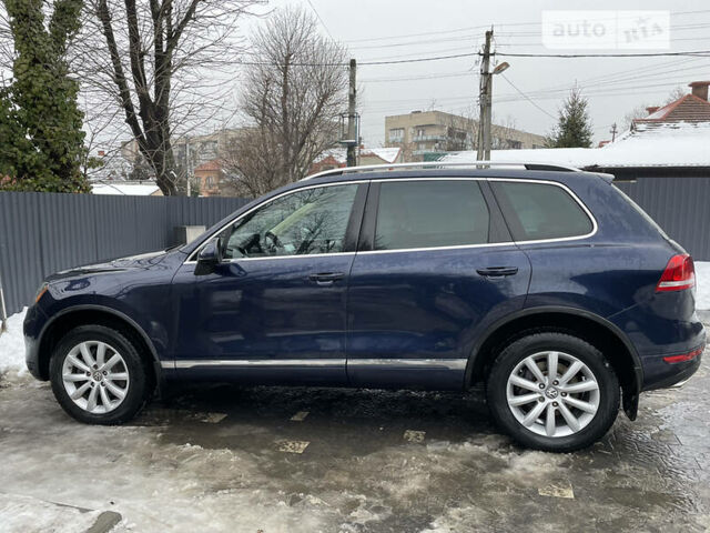 Синий Фольксваген Туарег, объемом двигателя 3 л и пробегом 201 тыс. км за 15500 $, фото 2 на Automoto.ua