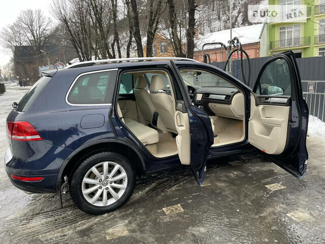 Синий Фольксваген Туарег, объемом двигателя 3 л и пробегом 201 тыс. км за 15500 $, фото 14 на Automoto.ua