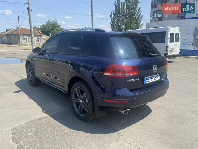 Синий Фольксваген Туарег, объемом двигателя 2.97 л и пробегом 249 тыс. км за 17300 $, фото 3 на Automoto.ua