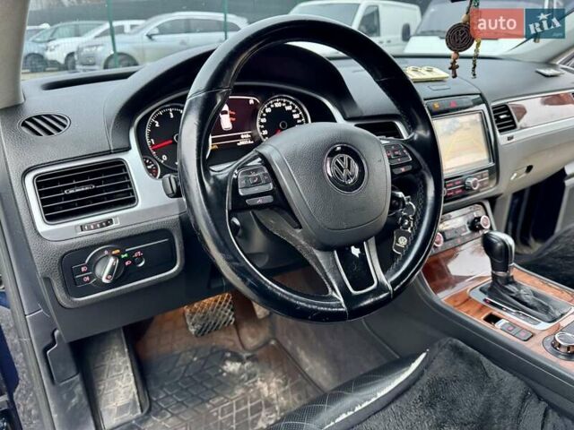Синій Фольксваген Туарег, об'ємом двигуна 2.97 л та пробігом 243 тис. км за 14999 $, фото 24 на Automoto.ua