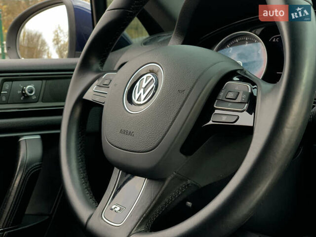 Синий Фольксваген Туарег, объемом двигателя 3 л и пробегом 210 тыс. км за 20999 $, фото 36 на Automoto.ua