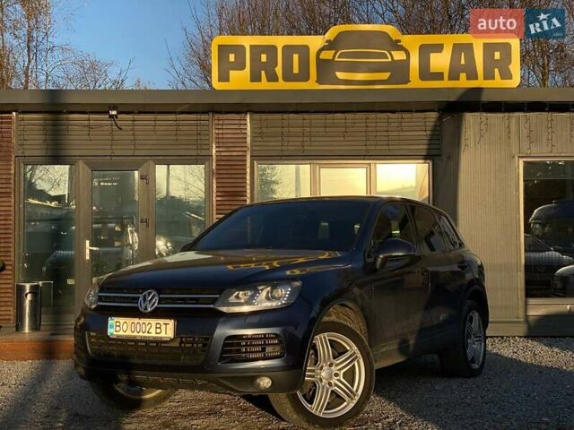 Синий Фольксваген Туарег, объемом двигателя 2.97 л и пробегом 370 тыс. км за 14600 $, фото 1 на Automoto.ua