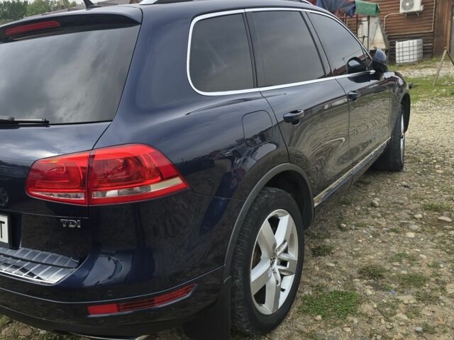 Синій Фольксваген Туарег, об'ємом двигуна 3 л та пробігом 240 тис. км за 355 $, фото 1 на Automoto.ua