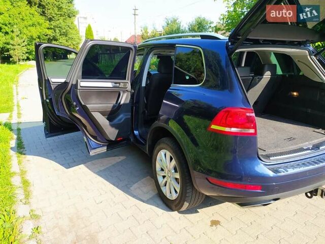 Синий Фольксваген Туарег, объемом двигателя 3 л и пробегом 195 тыс. км за 21000 $, фото 74 на Automoto.ua