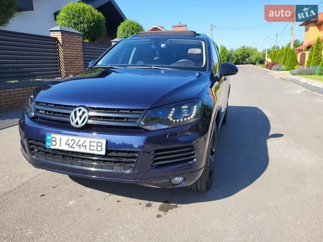 Синий Фольксваген Туарег, объемом двигателя 2.97 л и пробегом 221 тыс. км за 21400 $, фото 1 на Automoto.ua