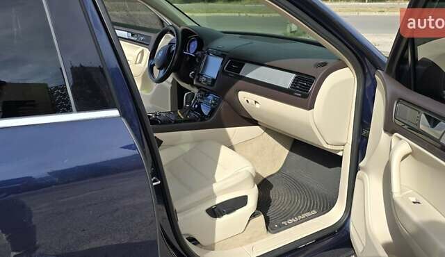 Синий Фольксваген Туарег, объемом двигателя 3 л и пробегом 214 тыс. км за 17900 $, фото 12 на Automoto.ua