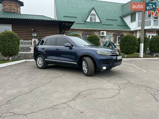 Синий Фольксваген Туарег, объемом двигателя 2.97 л и пробегом 257 тыс. км за 17850 $, фото 1 на Automoto.ua