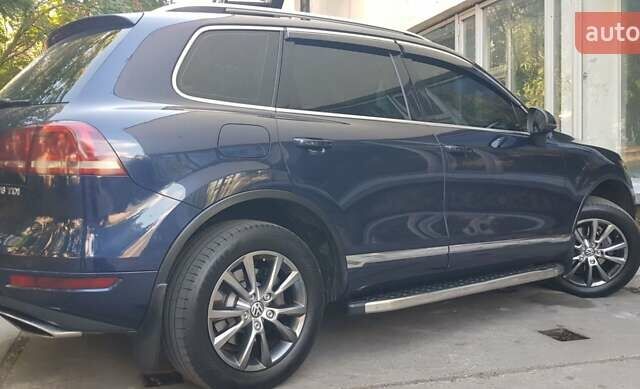 Синий Фольксваген Туарег, объемом двигателя 2.97 л и пробегом 325 тыс. км за 21500 $, фото 28 на Automoto.ua