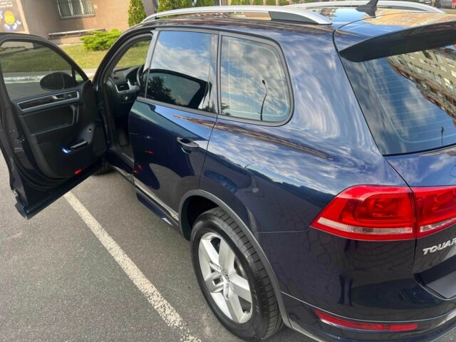 Синий Фольксваген Туарег, объемом двигателя 3 л и пробегом 140 тыс. км за 22000 $, фото 1 на Automoto.ua