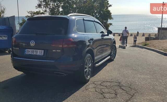 Синий Фольксваген Туарег, объемом двигателя 2.97 л и пробегом 325 тыс. км за 21500 $, фото 8 на Automoto.ua