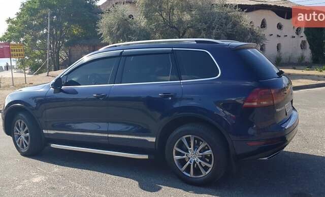 Синий Фольксваген Туарег, объемом двигателя 2.97 л и пробегом 325 тыс. км за 21500 $, фото 5 на Automoto.ua