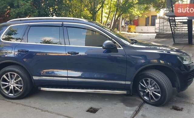 Синий Фольксваген Туарег, объемом двигателя 2.97 л и пробегом 325 тыс. км за 21500 $, фото 29 на Automoto.ua