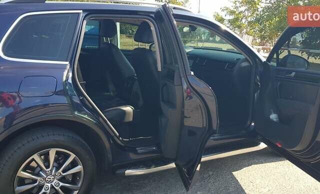 Синий Фольксваген Туарег, объемом двигателя 2.97 л и пробегом 325 тыс. км за 21500 $, фото 21 на Automoto.ua