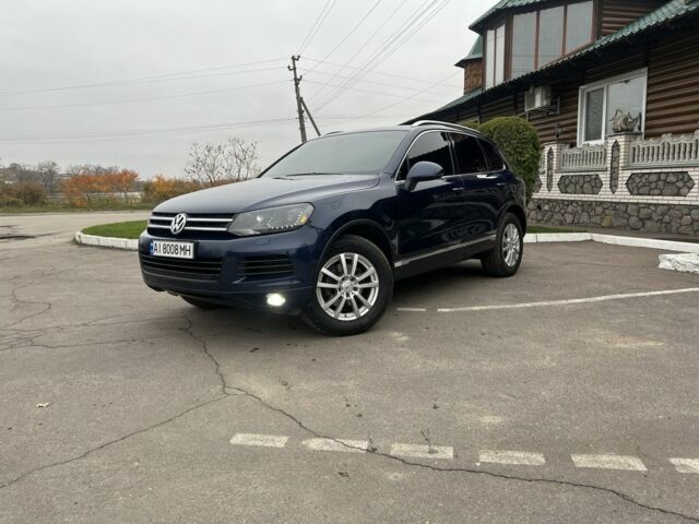 Синий Фольксваген Туарег, объемом двигателя 3 л и пробегом 257 тыс. км за 17850 $, фото 1 на Automoto.ua