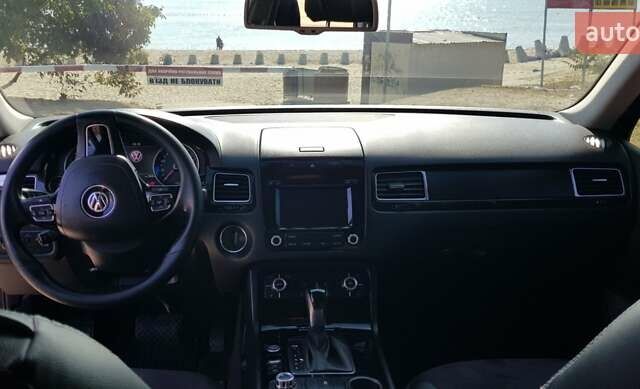 Синий Фольксваген Туарег, объемом двигателя 2.97 л и пробегом 325 тыс. км за 21500 $, фото 14 на Automoto.ua