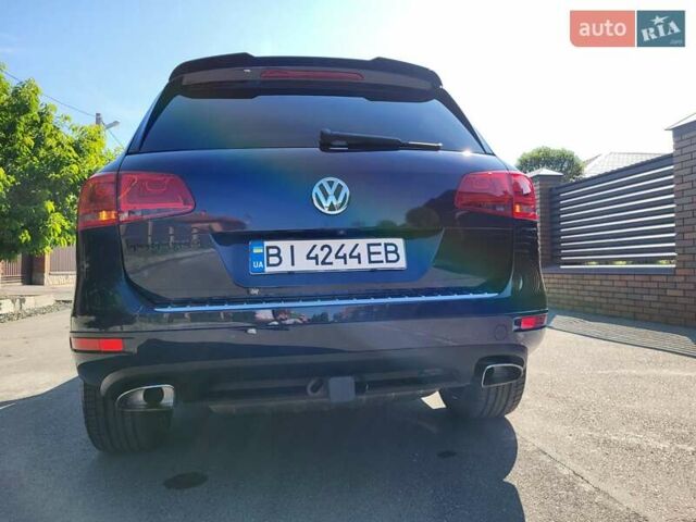 Синий Фольксваген Туарег, объемом двигателя 2.97 л и пробегом 221 тыс. км за 21400 $, фото 13 на Automoto.ua