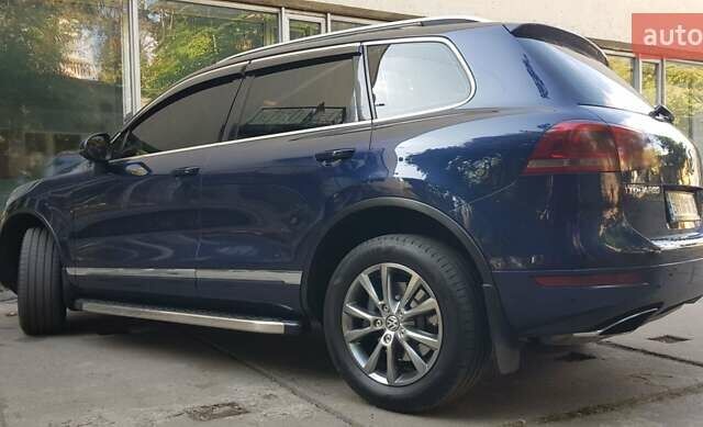 Синий Фольксваген Туарег, объемом двигателя 2.97 л и пробегом 325 тыс. км за 21500 $, фото 25 на Automoto.ua