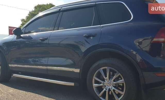 Синий Фольксваген Туарег, объемом двигателя 2.97 л и пробегом 325 тыс. км за 21500 $, фото 15 на Automoto.ua